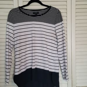 Nautica knit shirt, navy/white stripe with navy blouse peaking out from bottom.